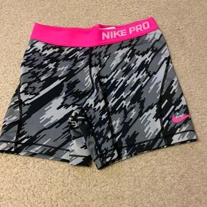 kids L pink and grey nike pros